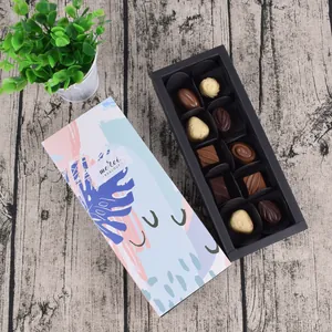 Detail view of 10 handmade chocolates in a premium rectangular drawer gift box