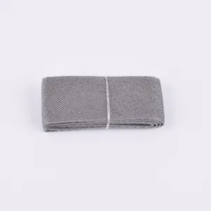 Macro detail of high-quality grey polyester ribbon with textured horizontal weaving