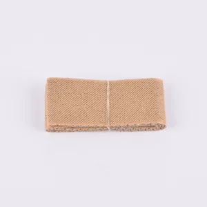 Detailed macro shot of khaki elastic mesh polyester webbing texture and weave