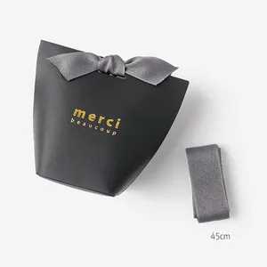 Dark grey gift box with gold merci beaucoup text and a 45cm polyester ribbon bow