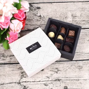 Square drawer gift box with 9 assorted chocolates and elegant merci beaucoupe design