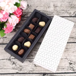Premium 12-grid drawer gift box for chocolates with geometric sleeve and floral decor
