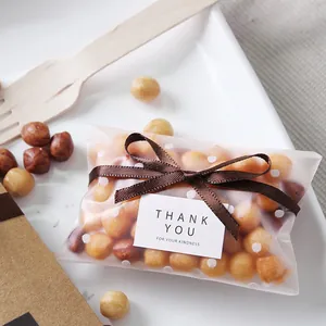 Dark brown polyester ribbon for gift wrapping with white polka dot food packaging bag