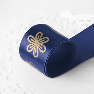 Navy blue satin ribbon with golden floral print for gift box packaging and decoration