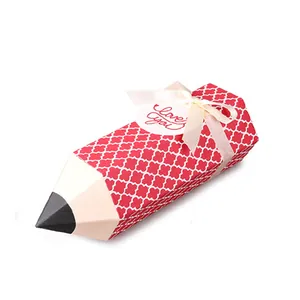 Creative pencil shaped gift box in red with clover pattern and love you tag for candies