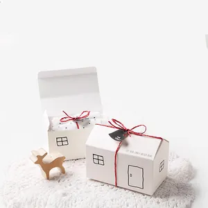 House-shaped gift box with red rope and heart tag for bakery and party packaging