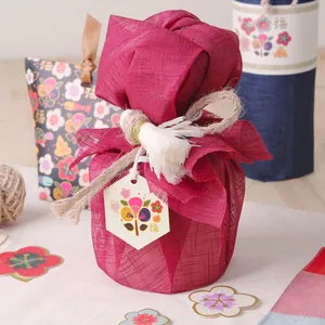 DIY hexagonal gift tags with flower patterns and Fu character on festive packaging