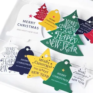 Colorful Christmas hanging gift tags with festive bells and trees on white background