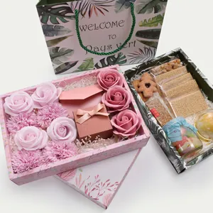 Exquisite gift set featuring floral gift bags and boxes with premium snacks and soap roses