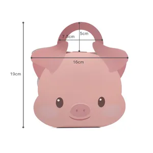 Pink pig shaped gift box with dimensions 19x16cm showing handle and cartoon design