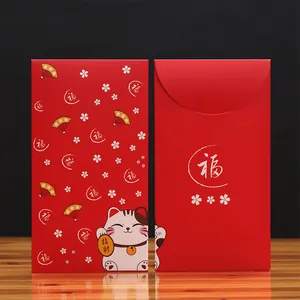 Enveloppes rouges du Nouvel An chinois avec motifs festifs Maneki-neko et Fu