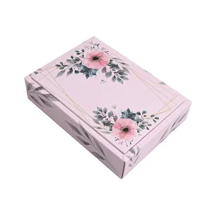 Elegant rectangular pink floral gift box with gold geometric lines for packaging