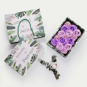 Soap flower gift box with green leaf pattern and purple rose carnation arrangement