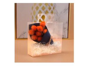 Sacchetto regalo in PVC smerigliato semitrasparente con manico e fiori secchi arancio