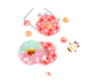 Cute doughnut-shaped mini self-sealing gift bag with clear window showing colorful candies
