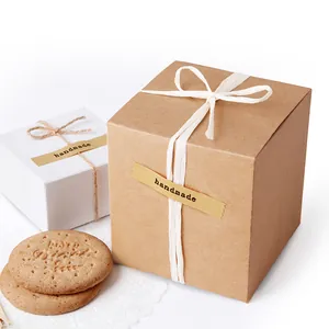 Minimalist kraft paper gift box set with handmade stickers and ribbon for baking packaging