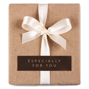 Minimalist kraft paper gift box with cream silk ribbon bow for bakery and jewelry
