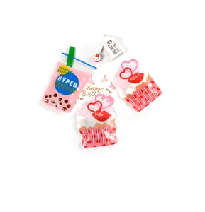 Detailed view of bubble tea and cupcake shaped resealable gift bags with blue zip locks