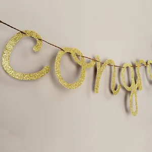 Golden glitter 'Congrats' banner for graduation and wedding party wall decoration