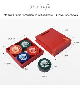 Vue détaillée du coffret cadeau rouge avec 4 boîtes florales et sac assorti