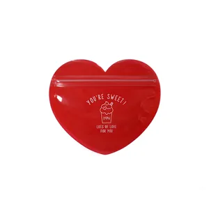 Red heart-shaped self-sealing plastic gift bags with sweet patterns and zipper closure