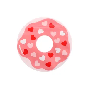 Pink doughnut shaped self-sealing gift bag with cute heart pattern and mini round design