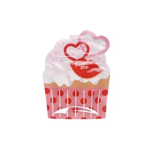 Pink cupcake-shaped self-sealing bags with heart handle and kiss me design for candy gifts