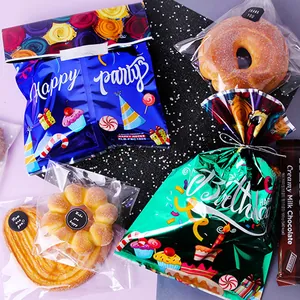 Colorful metallic birthday party gift bags with Happy Birthday prints and treat packaging