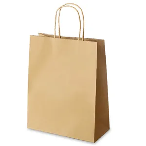 Sac cadeau en papier kraft marron avec poignées torsadées et bord dentelé sur fond blanc