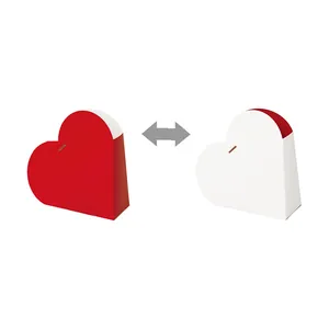 Red and white heart-shaped gift boxes for Valentine's Day cookies and candies