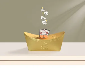 Detalle de caja de dulces lingote de oro con relieve y adorno de conejo lindo