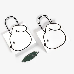 Minimalist white paper gift bag with cute black rabbit print and black string handles