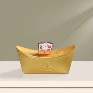 Golden sycee shaped candy gift box with lucky rabbit decor for Lunar New Year