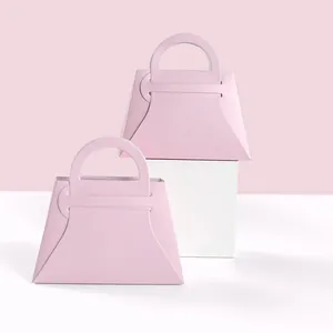 Elegantes cajas de regalo para bodas en papel rosa mate con asas semicirculares, set de dos