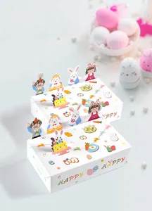 Détail de boîte cadeau de Pâques avec lapin 3D et lettrage coloré Happy