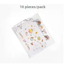 Flat-lay view of 10-piece pack cartoon Easter paper gift boxes with bunny and egg designs