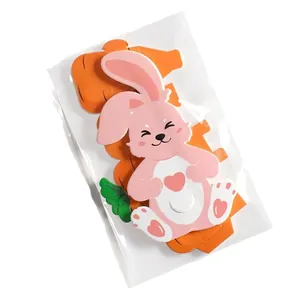 Pink cartoon Easter bunny candy packaging card with carrot base in clear OPP bag