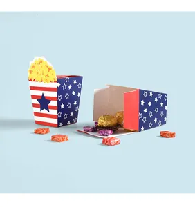 Macro detail of patriotic popcorn candy boxes with red and blue star patterns for parties