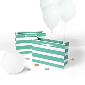 Cute green striped paper gift bags with silver ribbon handles for party shopping packaging