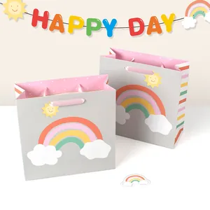 Rainbow and sun printed grey gift bags with pink satin handles for birthday celebrations