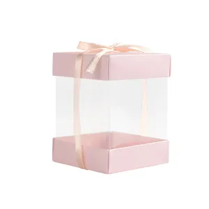 Scatola regalo rosa quadrata con finestra trasparente e nastro per dolci e gioielli