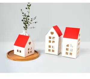 Three-piece red roof house gift boxes with heart-shaped cutouts for cookies and candies
