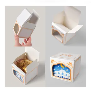 Detailed views of white gift box with transparent window and decorative orange happy text