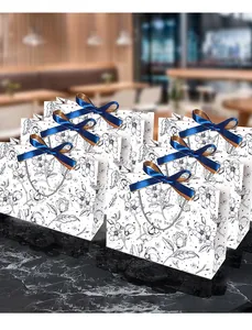 Detailed view of luxury paper gift bags with floral patterns and bow ribbon handles