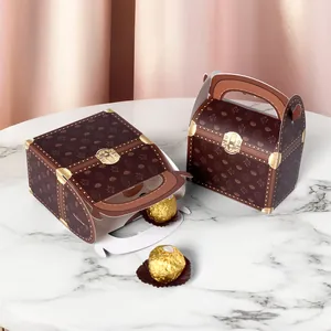 Treasure chest style faux leather paper gift box with gold lock patterns and handle