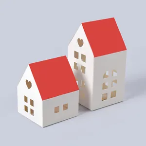 Set of two decorative red and white house-shaped gift boxes with heart cut-outs