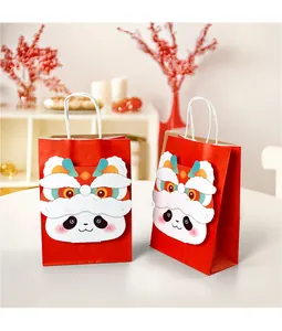 Detail of red New Year gift bag with 3D lion dance panda motif and white braided handle