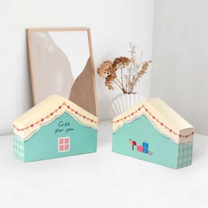 Scatola regalo a forma di casa verde menta con illustrazioni per dolci e pasticceria