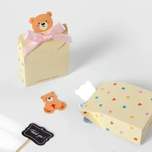 Cute cream cartoon gift box with pink ribbon bow and bear decoration for chocolates