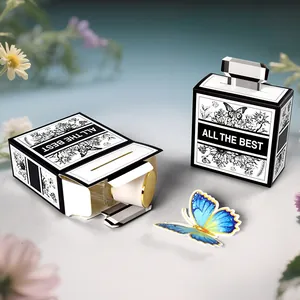 Creative black and white perfume gift box with floral butterfly illustration and gold cap bottle